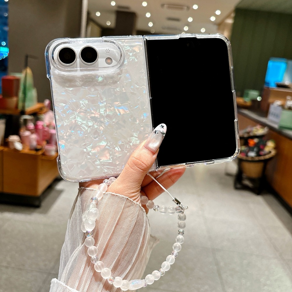 غطاء هاتف صلب بتصميم قشرة قزحي - مراجعة Camera Wrist Strap وسعره